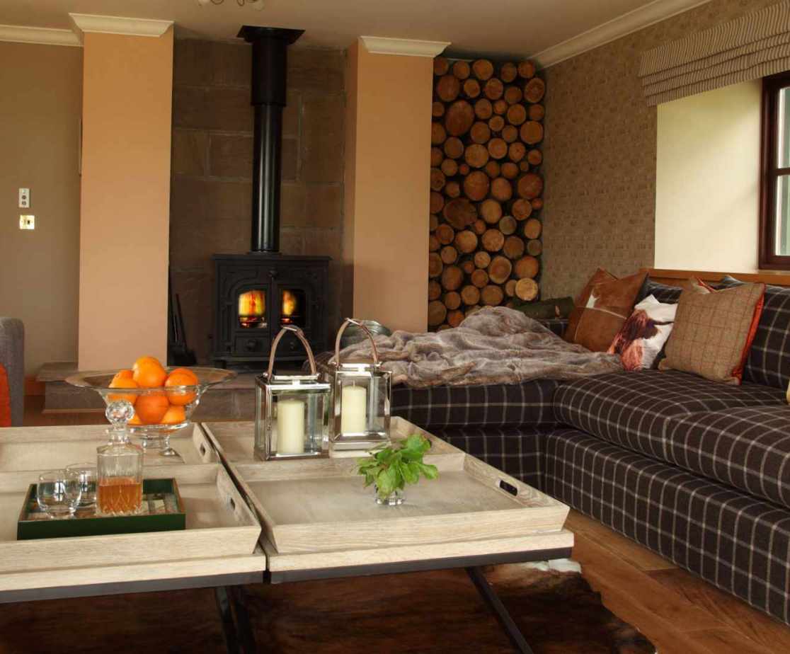 The drawing room with its wood burning stove is a wonderfully cosy place to relax