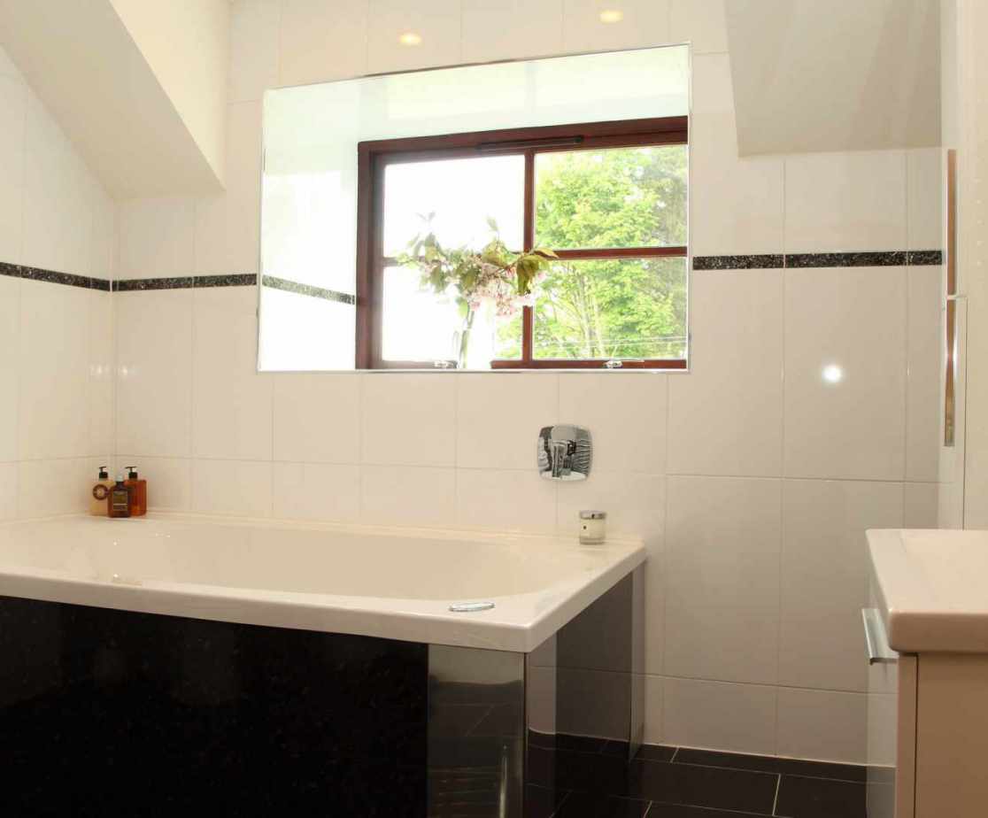 All the of the 5 bedrooms have en-suite shower rooms, with this being an additional bathroom