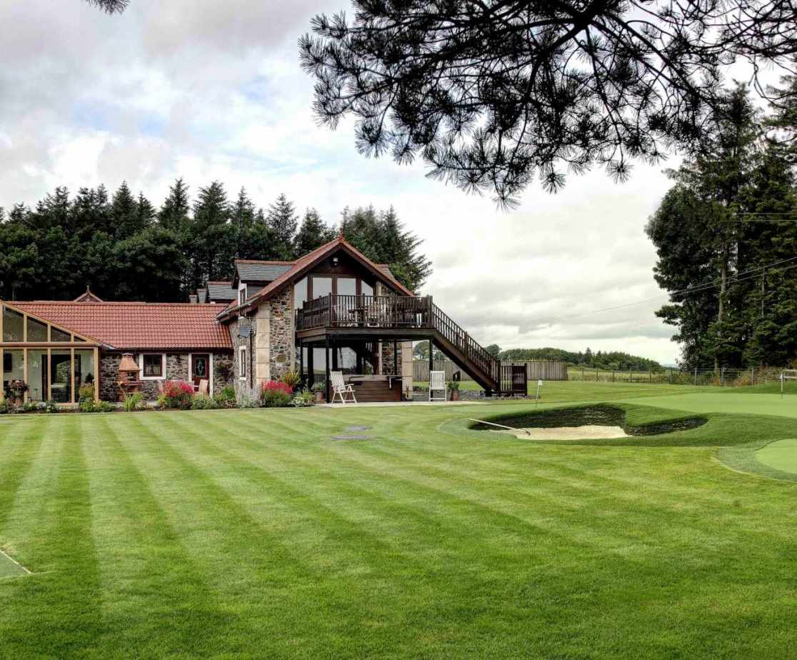 5 Star Holiday House with private grounds and 5 hole putting green.