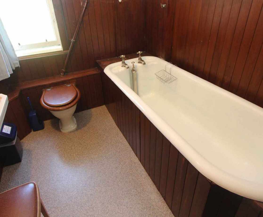 One of the 3 bathrooms (and 2 showers) available