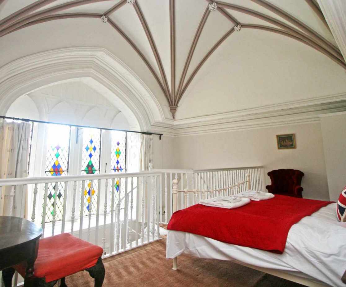 \'Wallace\' bedroom on the first floor, with bed at mezanine level