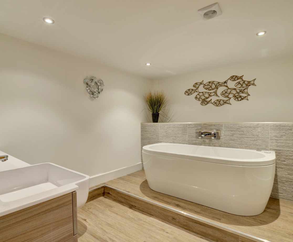 The family bathroom is a real indulgence incorporating a deluxe Jacuzzi spa bath with WiFi and mood lighting