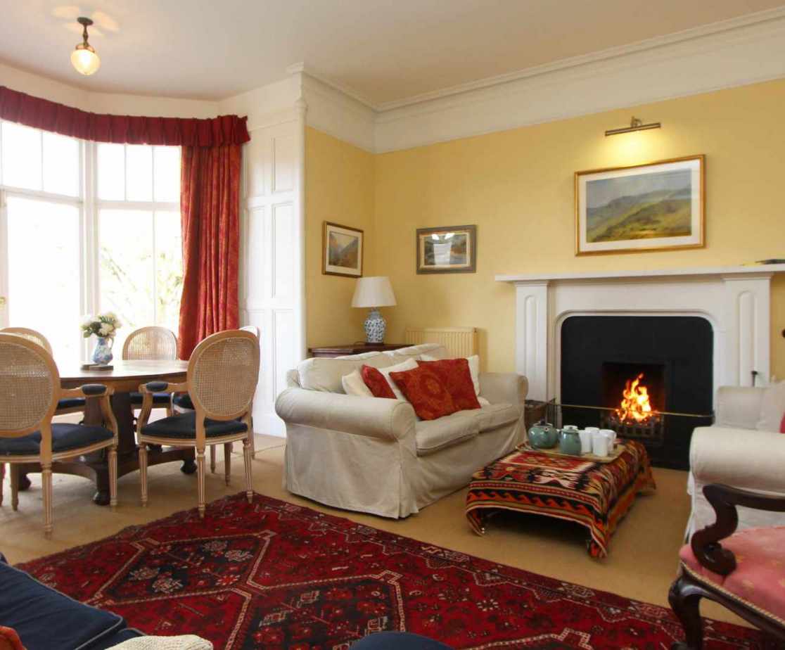A warm welcome awaits in the drawing room