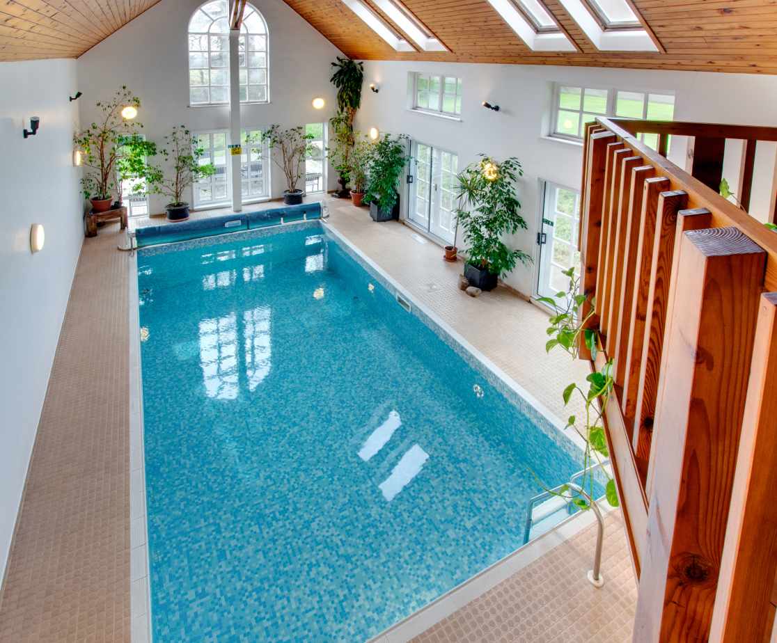 A super private indoor heated swimming pool with shower, toilet & sauna.
