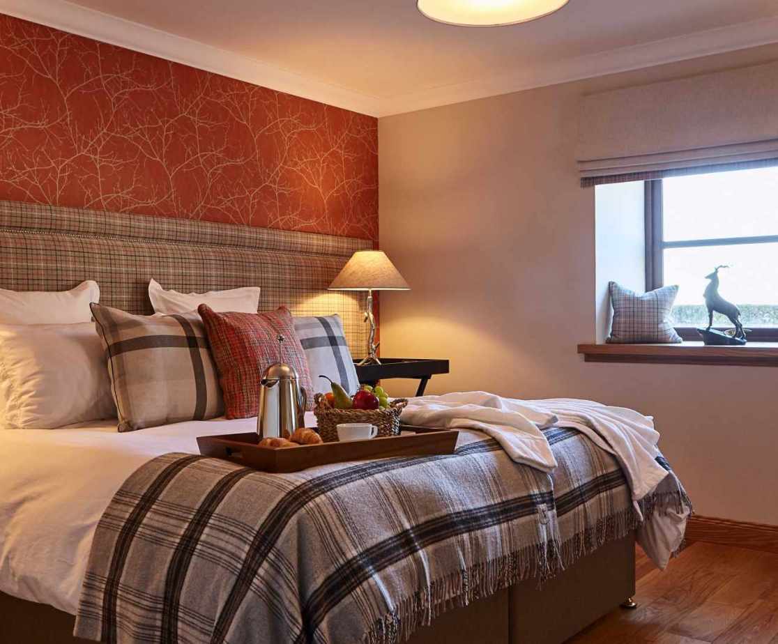 Room 2 is a super king size zip-and-link double bed on the ground floor