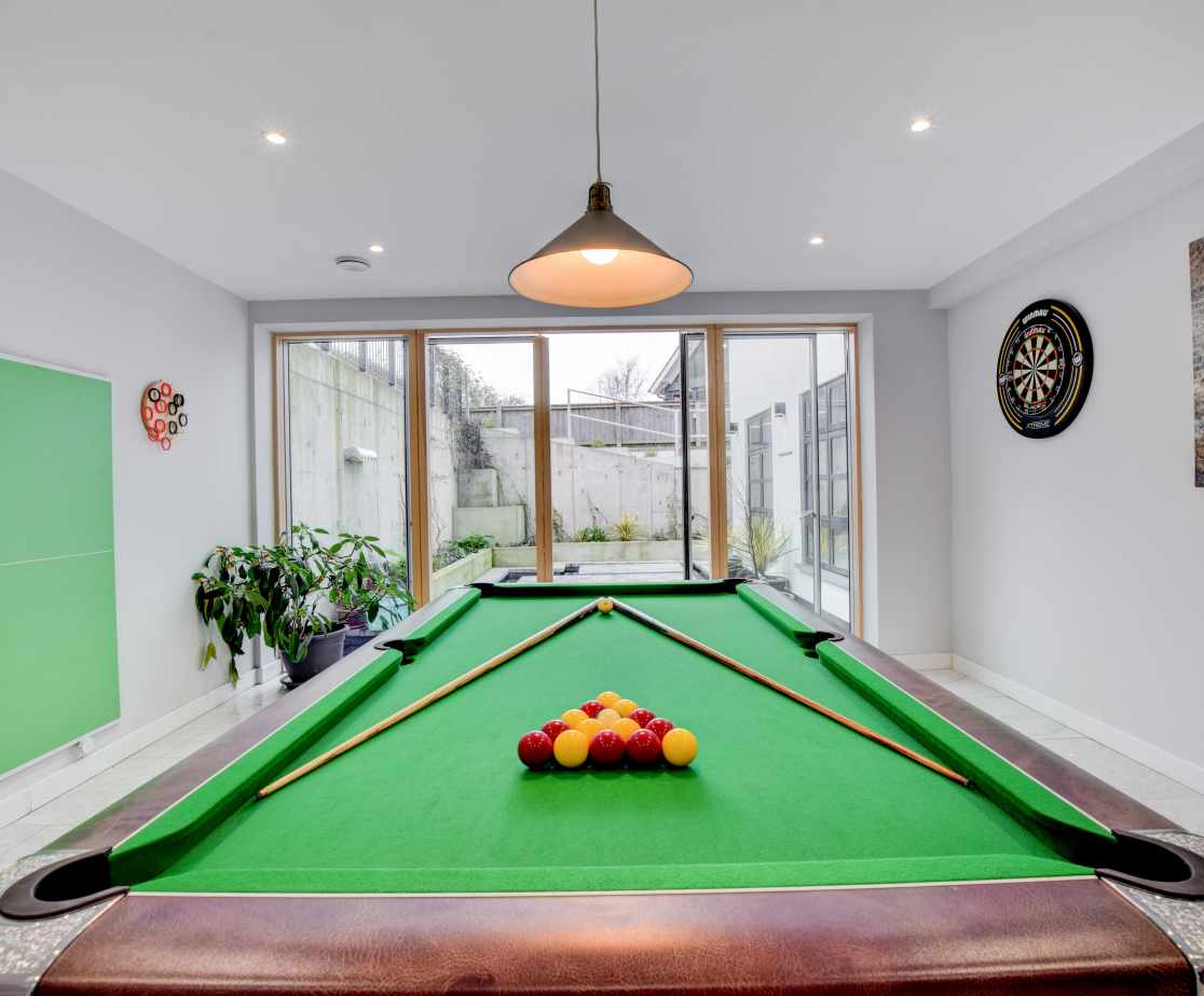 Games room with pool table and darts