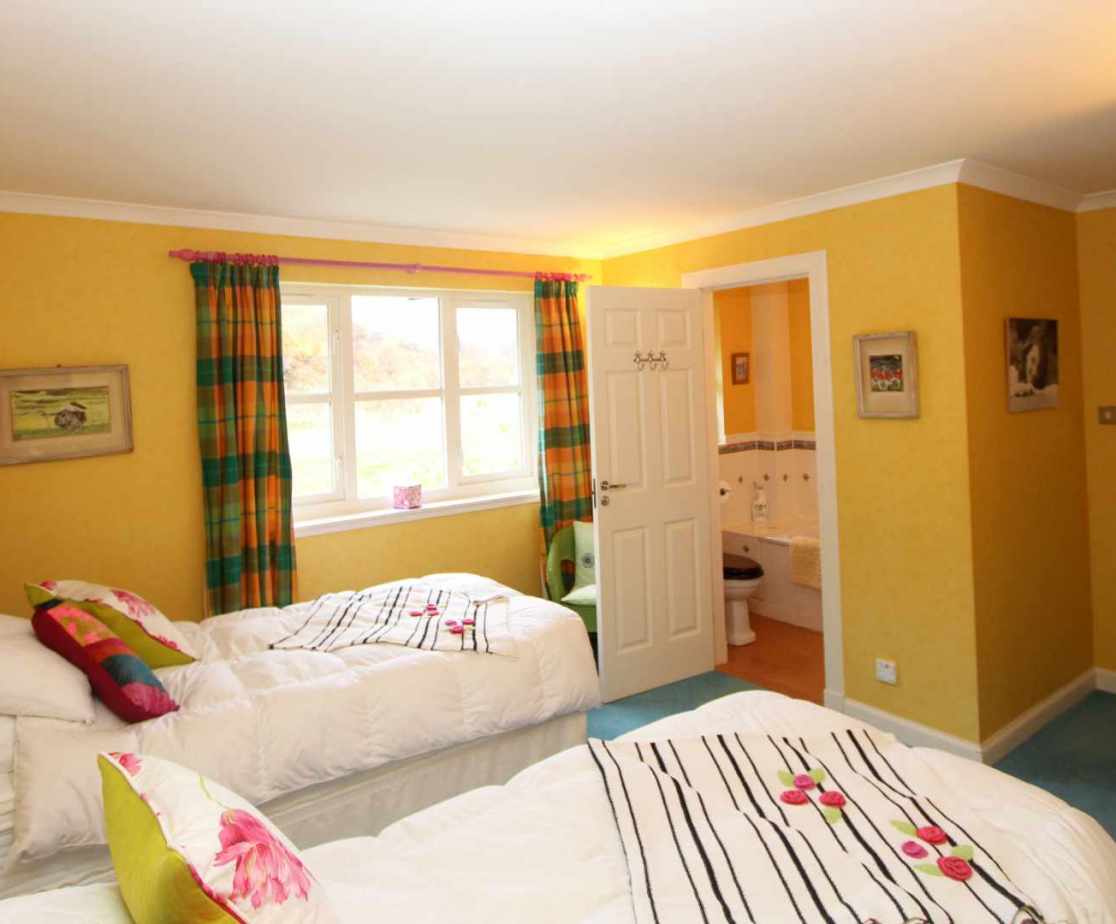 Twin room \'Rebecca\' is located on the ground floor and has an en-suite bathroom
