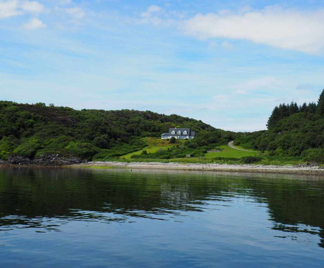 Holiday home on a private track on the edge of a Loch in Scotland overlooking the Mull of Kintyre