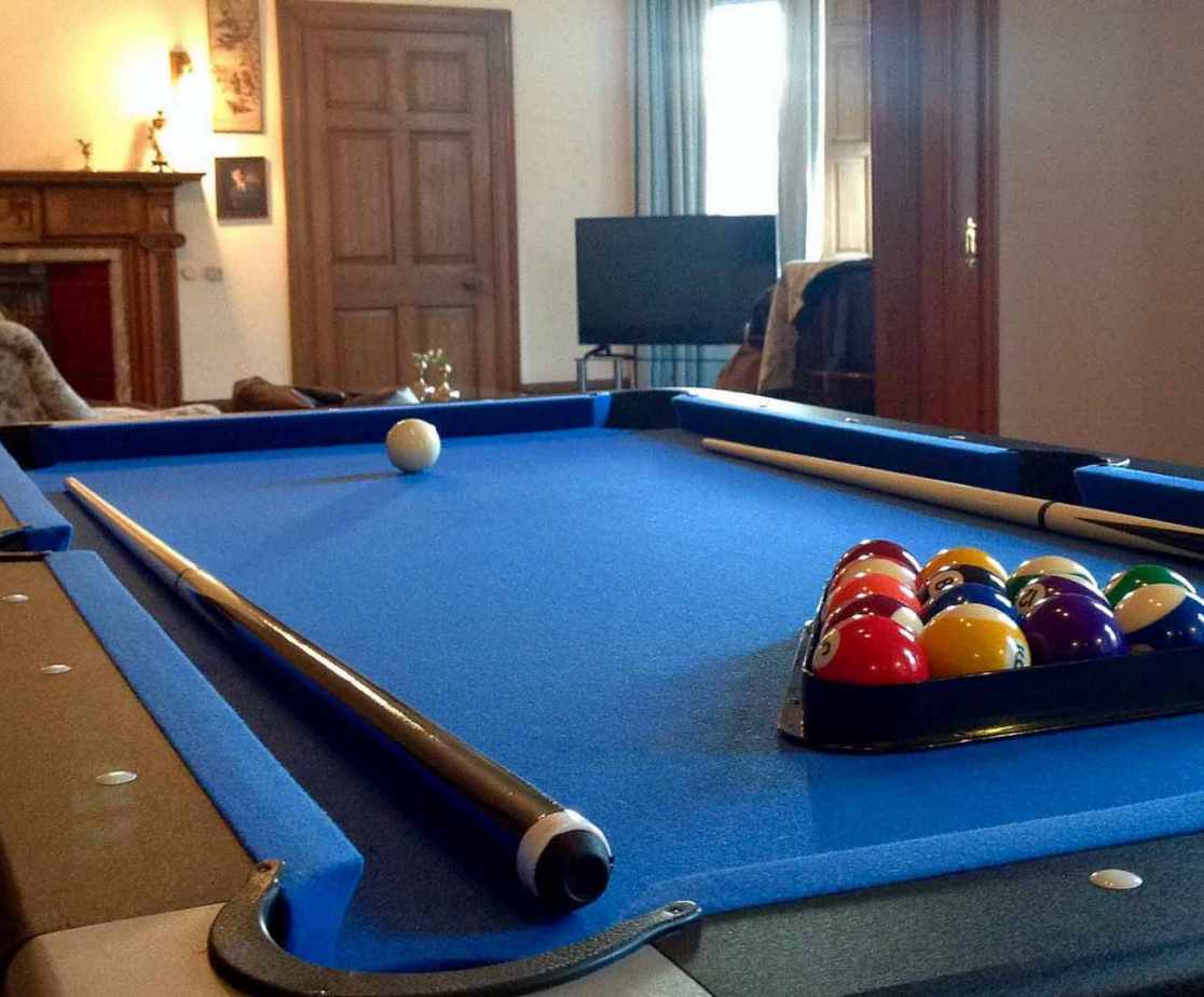 The family sitting room also houses a pool table