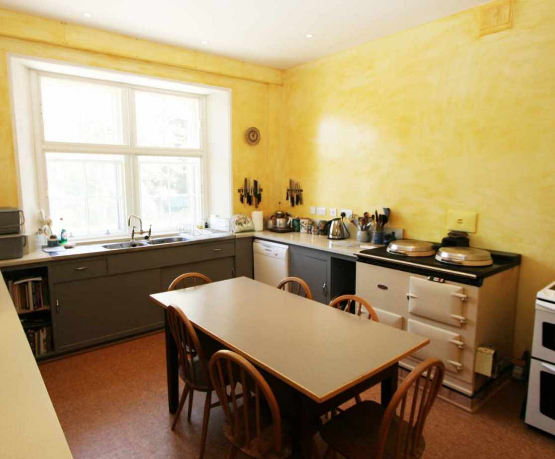 The kitchen is bright and well equipped for self catering groups