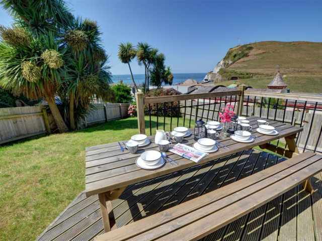A fantastic spot to have breakfast together - palm trees and sea views! 